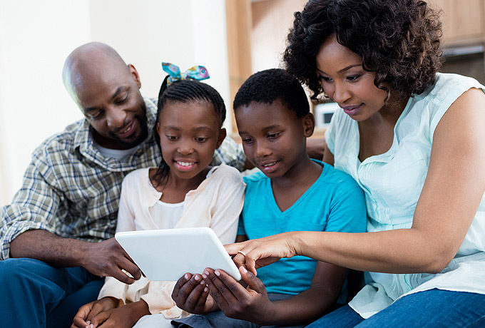 Family exploring savings accounts from Nicolet Bank