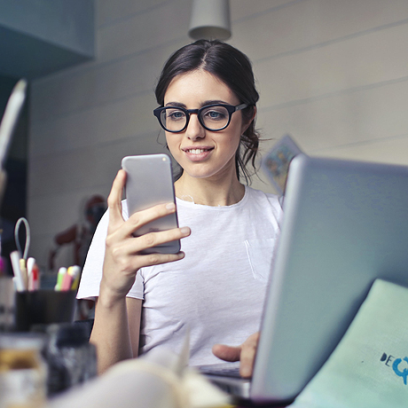 Mobile banking woman looking at phone