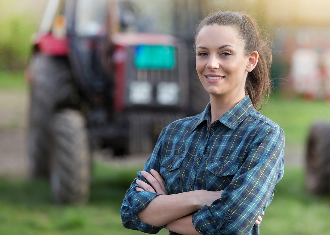 woman young farmer standing in field